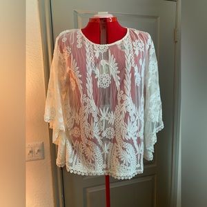 Lace overlay bat winged blouse